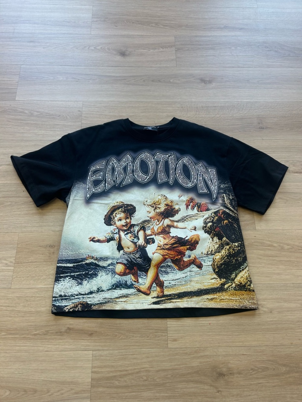 Black Graphic 'EMOTION' Short Sleeve Tee with Beach Children Print